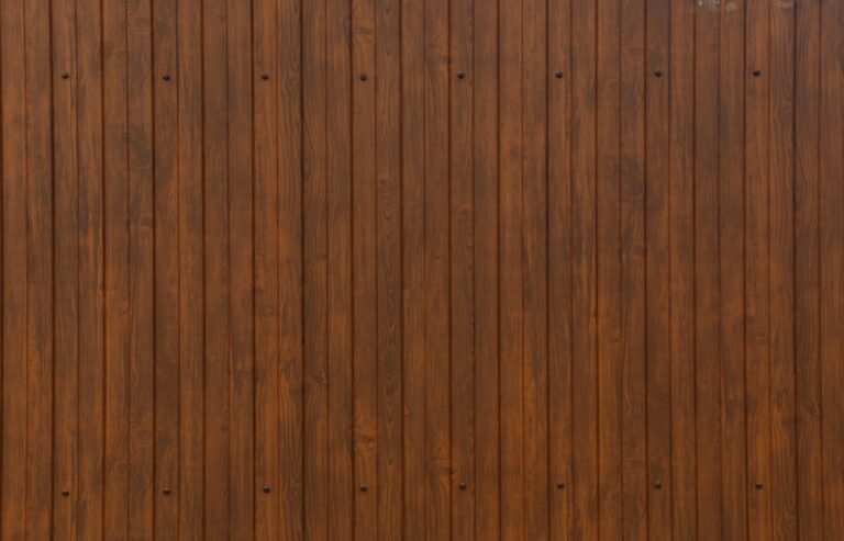Brown wooden wall during daytime - Fixing a Squeaky Floorboard: A Step-by-Step Guide
