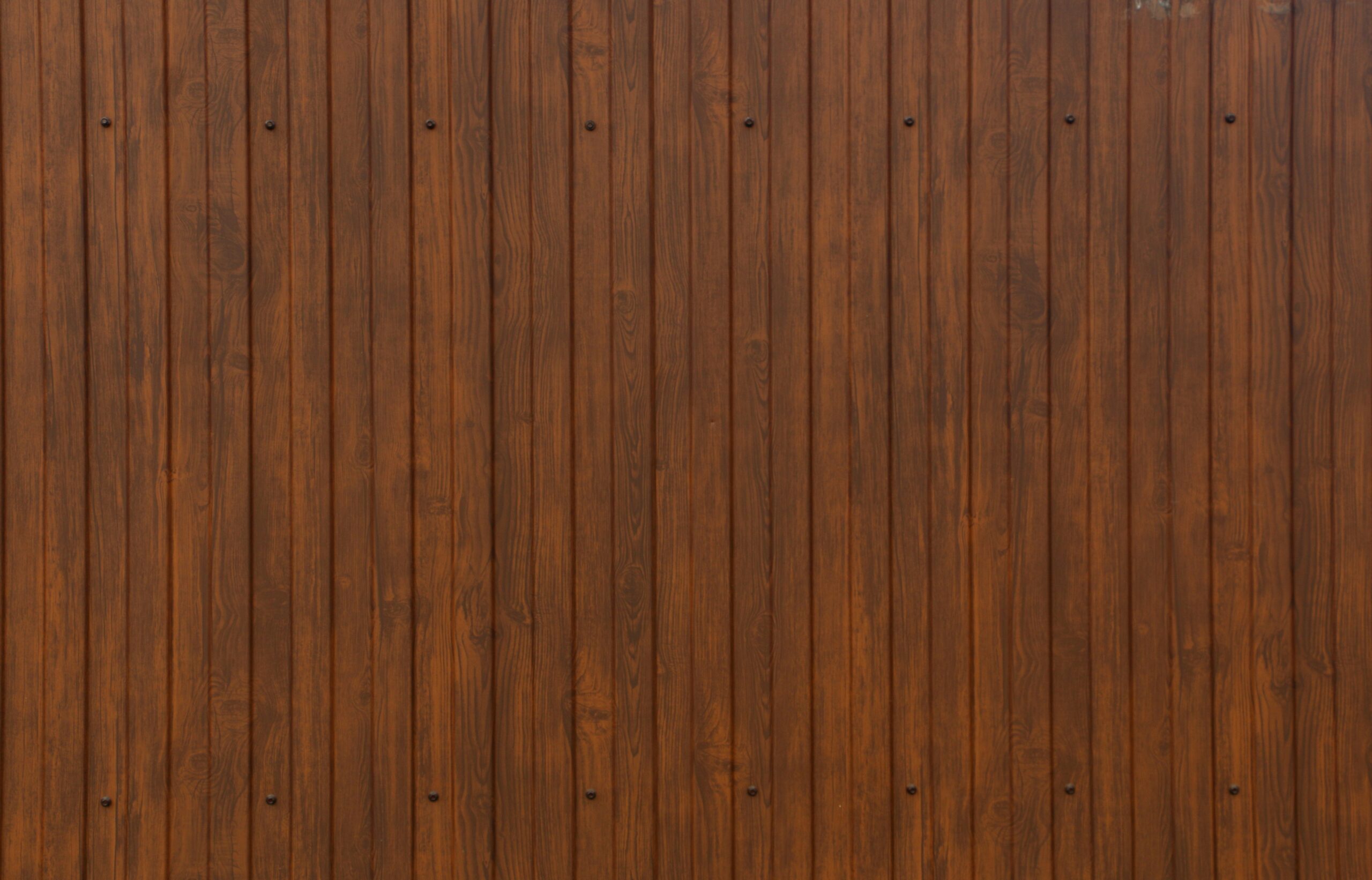 Brown wooden wall during daytime - Fixing a Squeaky Floorboard: A Step-by-Step Guide