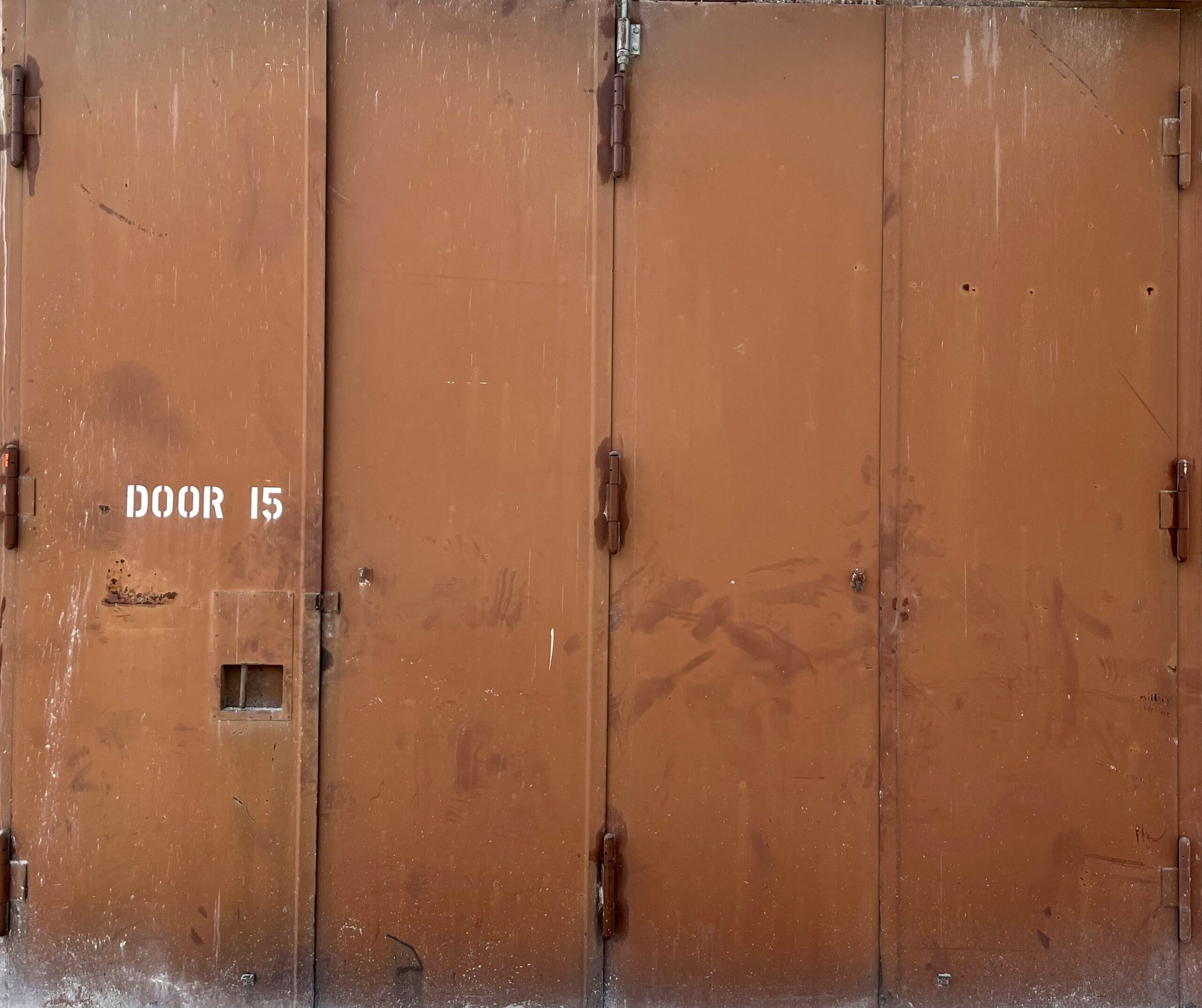 A brown door with a door 15 written on it - How to Fix a Squeaky Door Hinge Quickly and Easily
