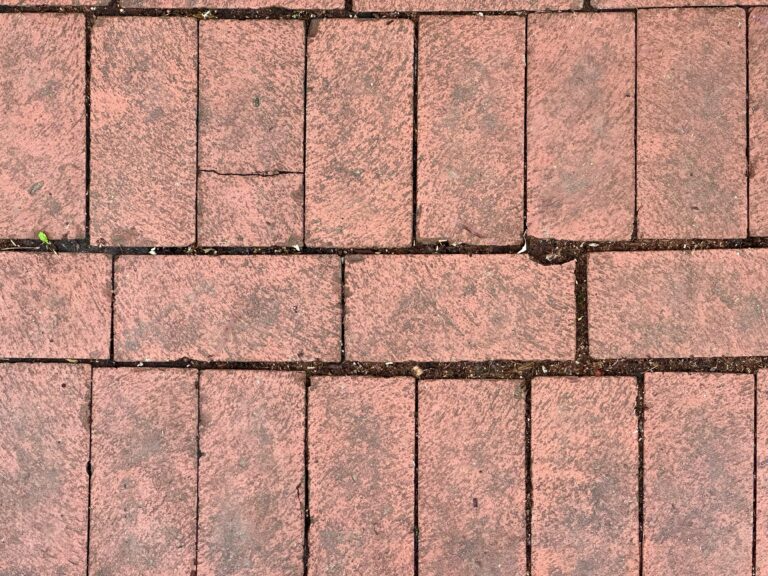 A red brick sidewalk texture - How to Fix Uneven Patio Slabs