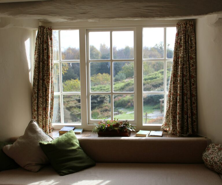 Window curtain open wide - How to Seal Gaps Around Windows for Better Insulation