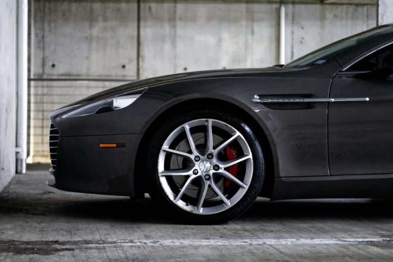 Dark grey luxury car parked indoors