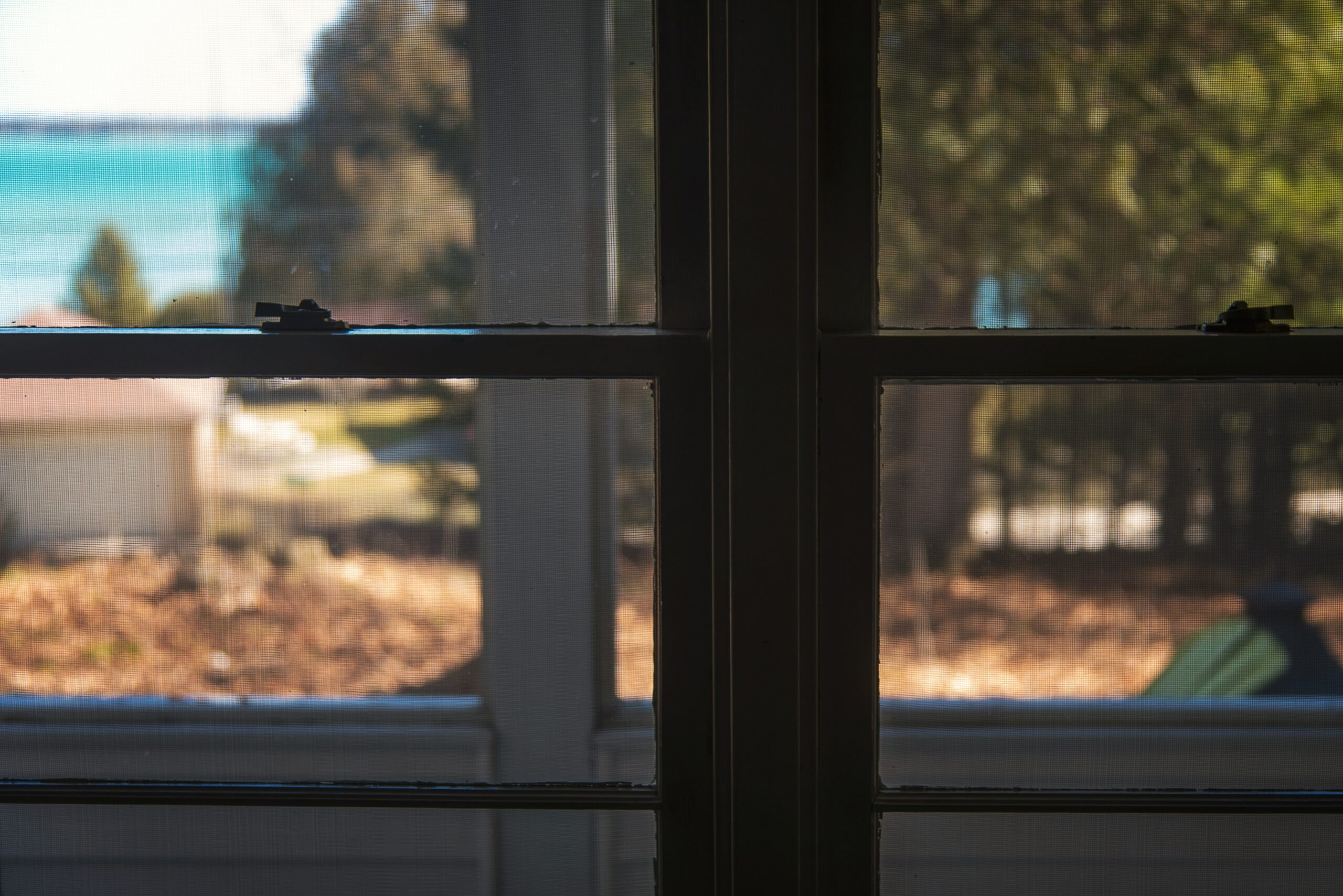 black wooden framed glass window