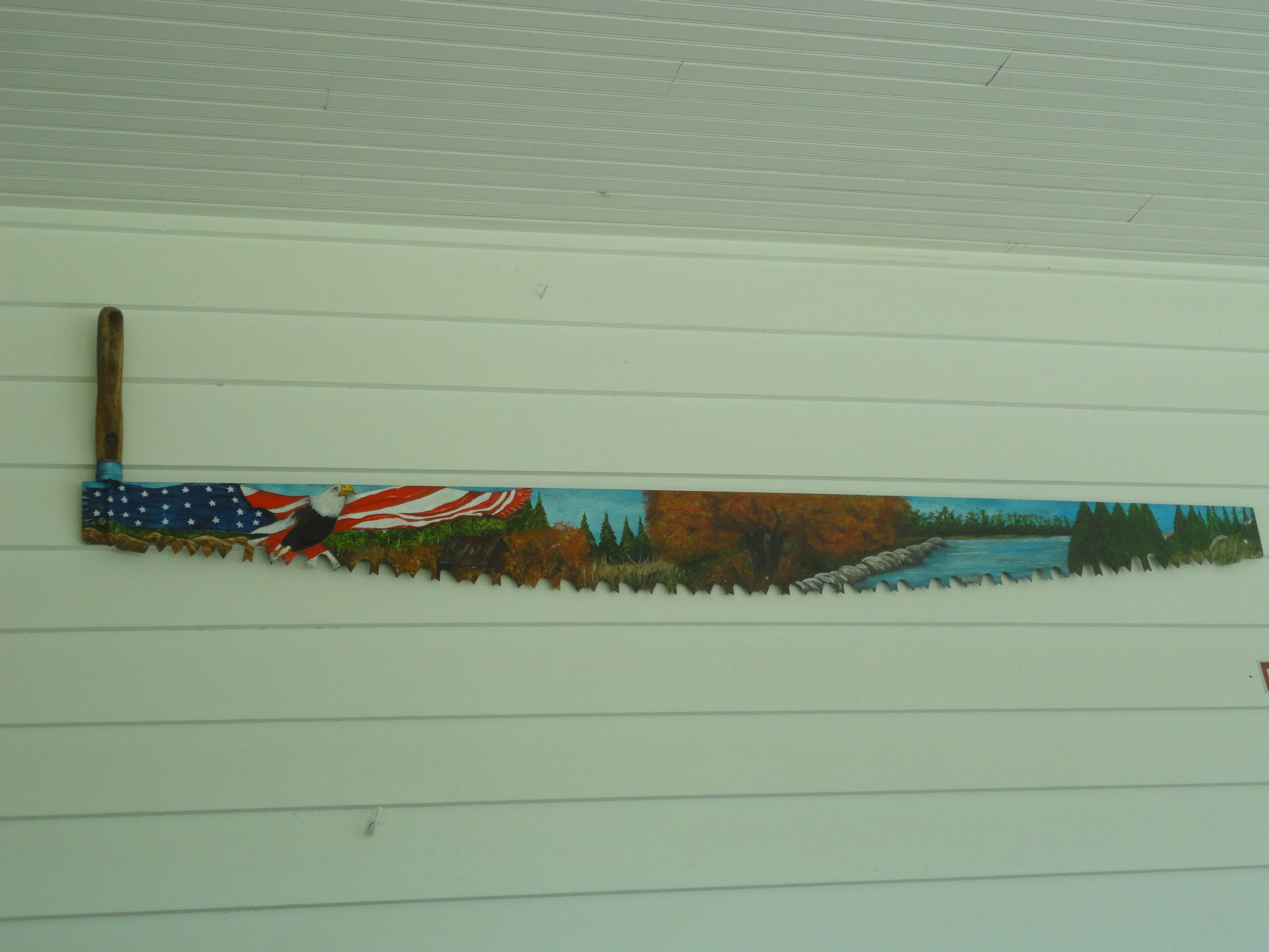a picture of an american flag on a wall