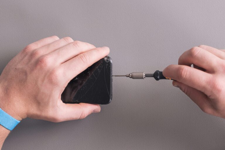 a person holding a black object