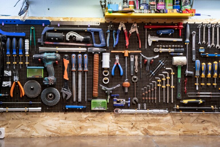 A bunch of tools hanging up on a wall - Best Tool Storage Options for Organised Home Repairs