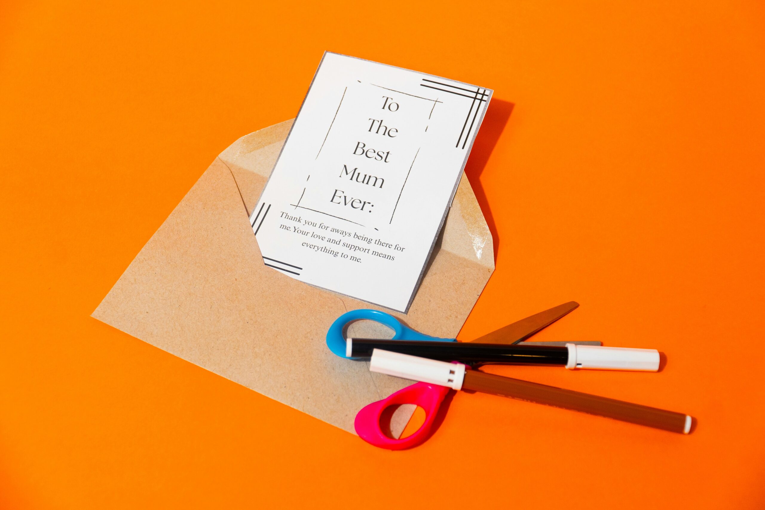 Card and envelope with scissors and marker